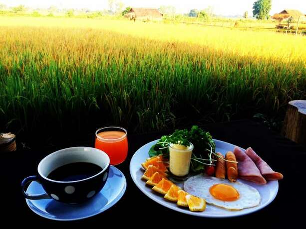 Imagen del bar/restaurante del Hotel The Vacation Baanraipaina. Foto 12