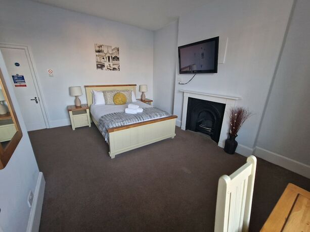 Imagen de la habitación del Hotel The Vale. Foto 16