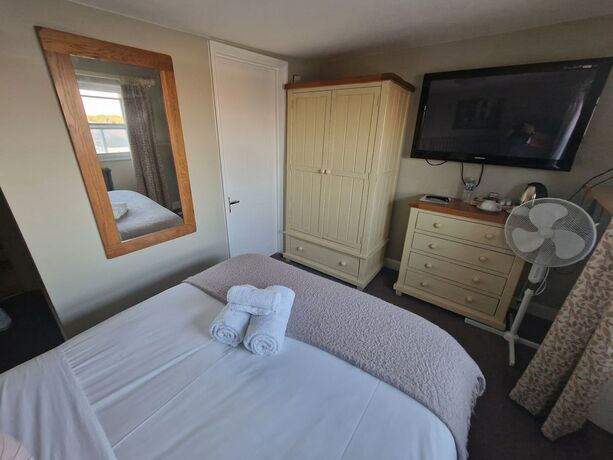 Imagen de la habitación del Hotel The Vale. Foto 17