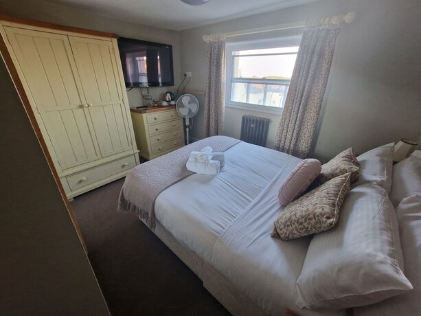 Imagen de la habitación del Hotel The Vale. Foto 18