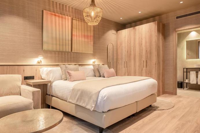 Imagen de la habitación del Hotel The Valentia Corretgería. Foto 7