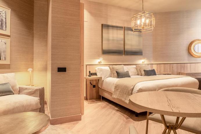 Imagen de la habitación del Hotel The Valentia Corretgería. Foto 8