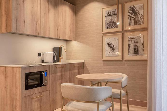 Imagen de la habitación del Hotel The Valentia Corretgería. Foto 10