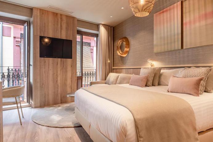 Imagen de la habitación del Hotel The Valentia Corretgería. Foto 11