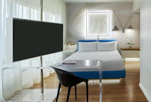 Imagen de la habitación del Hotel The Valorian Los Angeles, Curio Collection by Hilton. Foto 10