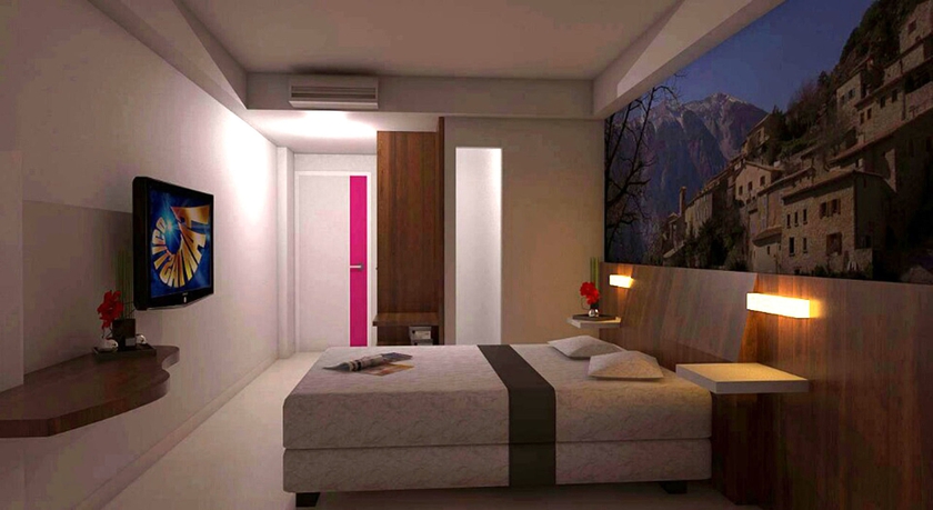 Imagen de la habitación del Hotel The Vasini. Foto 7
