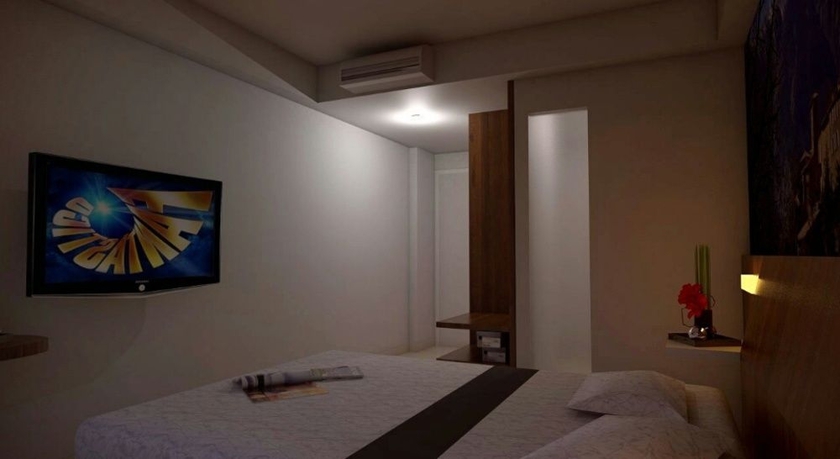 Imagen de la habitación del Hotel The Vasini. Foto 9