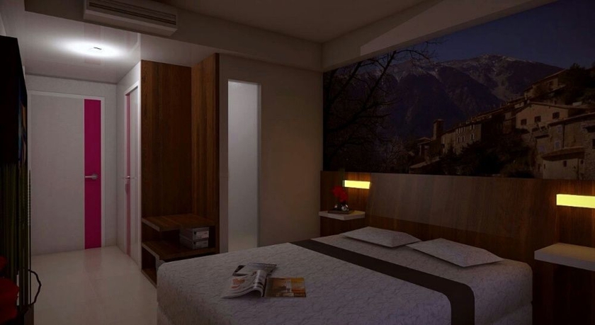 Imagen de la habitación del Hotel The Vasini. Foto 10
