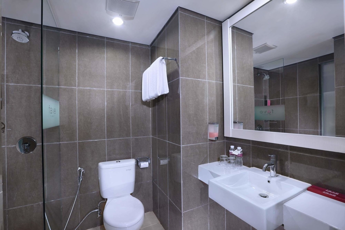 Imagen de la habitación del Hotel The Vasini. Foto 13