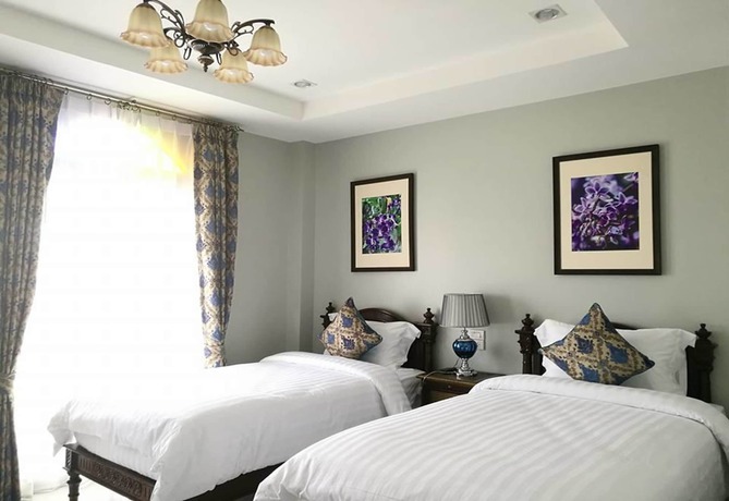 Imagen de la habitación del Hotel The Velvet Orchid. Foto 3