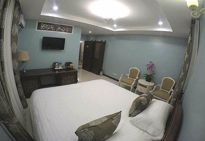 Imagen de la habitación del Hotel The Velvet Orchid. Foto 7