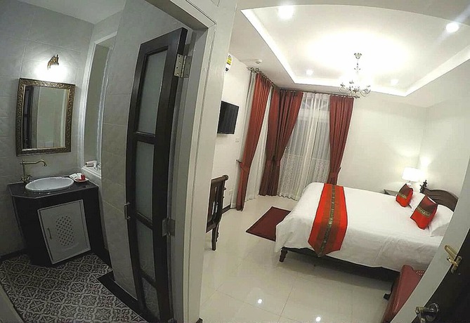 Imagen de la habitación del Hotel The Velvet Orchid. Foto 8