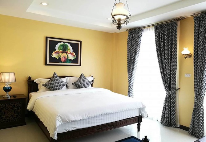 Imagen de la habitación del Hotel The Velvet Orchid. Foto 11