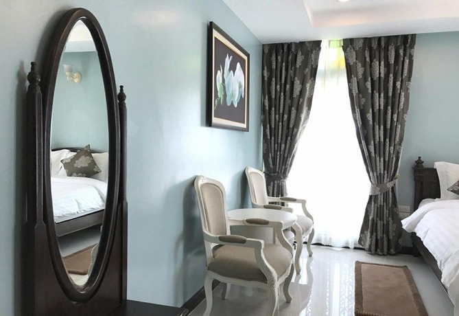 Imagen de la habitación del Hotel The Velvet Orchid. Foto 15