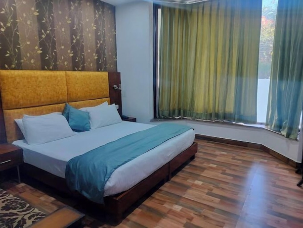 Imagen de la habitación del Hotel The Venessa. Foto 8