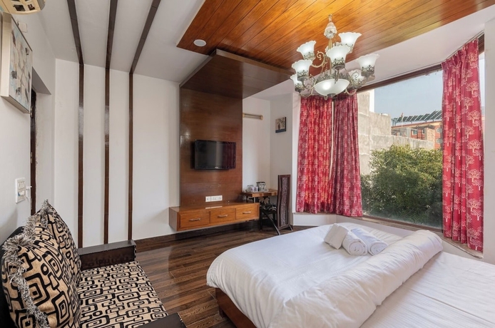 Imagen de la habitación del Hotel The Venessa. Foto 9