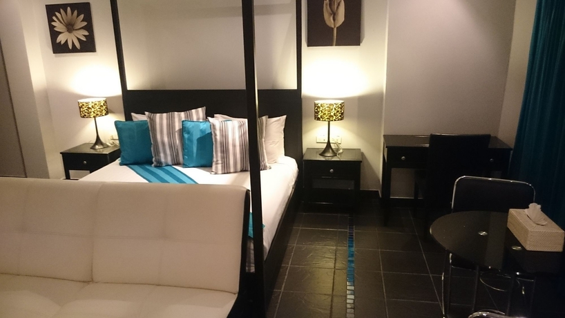 Imagen de la habitación del Hotel The Venue Residence and Cabaret. Foto 13