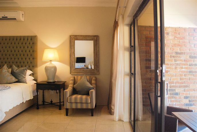 Imagen de los exteriores del Hotel The Victoria Falls Deluxe Suites. Foto 14