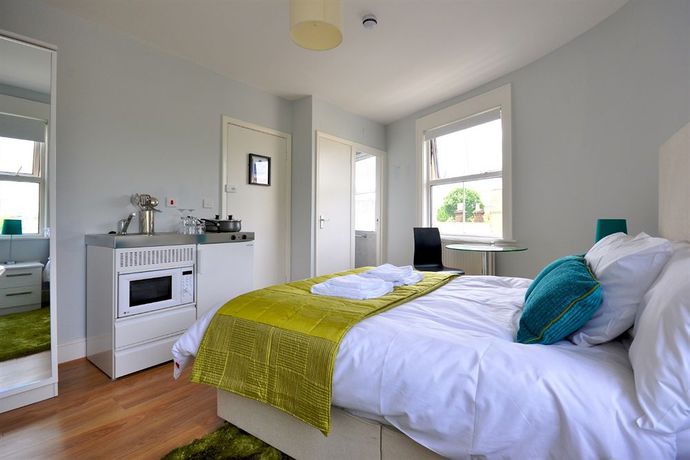 Imagen de la habitación del Hotel The Victoria Inn. Foto 13