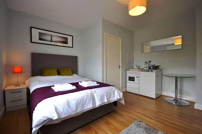 Imagen de la habitación del Hotel The Victoria Inn. Foto 15