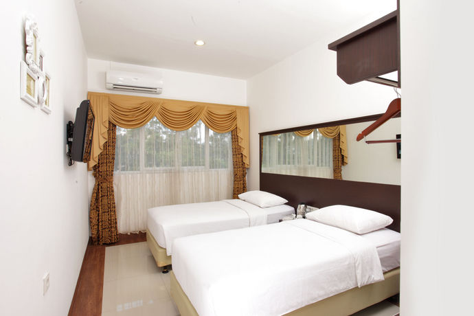 Imagen de la habitación del Hotel The Victoria Luxurious Guesthouse. Foto 9