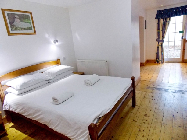 Imagen de la habitación del Hotel The Victorian House. Foto 2