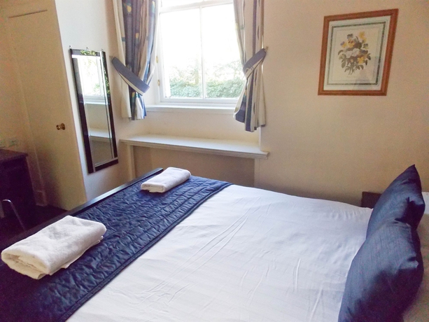 Imagen de la habitación del Hotel The Victorian House. Foto 4