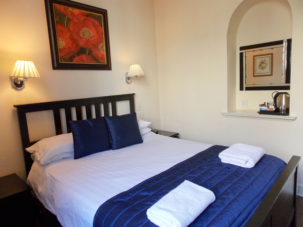 Imagen de la habitación del Hotel The Victorian House. Foto 5