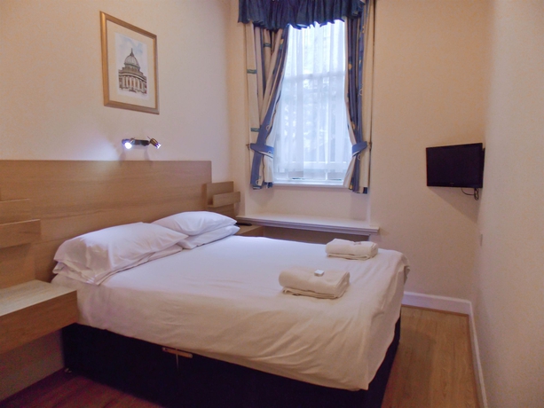 Imagen de la habitación del Hotel The Victorian House. Foto 7