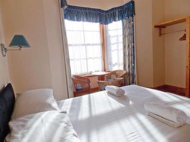 Imagen de la habitación del Hotel The Victorian House. Foto 14