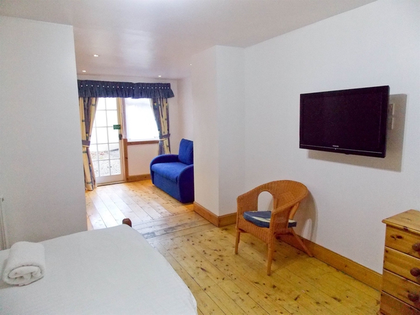 Imagen de la habitación del Hotel The Victorian House. Foto 15