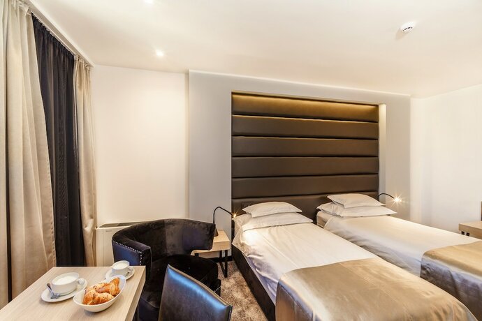 Imagen de la habitación del Hotel The View Luxury Rooms. Foto 18