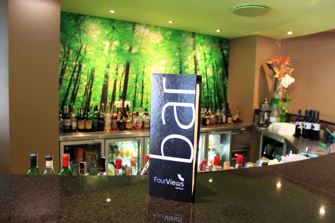 Imagen del bar/restaurante del Hotel The Views Oasis - Family Friendly. Foto 3