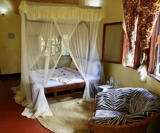 Imagen de la habitación del Hotel The Vijiji Center Lodge and Safari. Foto 9