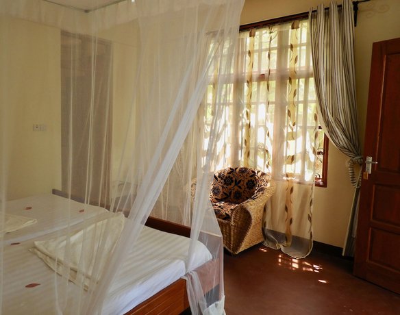 Imagen de la habitación del Hotel The Vijiji Center Lodge and Safari. Foto 13