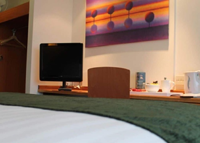 Imagen de la habitación del Hotel The Villa Express. Foto 6