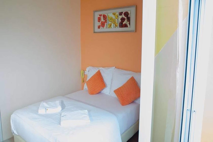 Imagen de la habitación del Hotel The Villa Khaopreedee. Foto 5