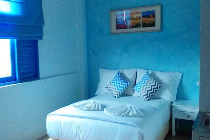 Imagen de la habitación del Hotel The Villa Khaopreedee. Foto 11