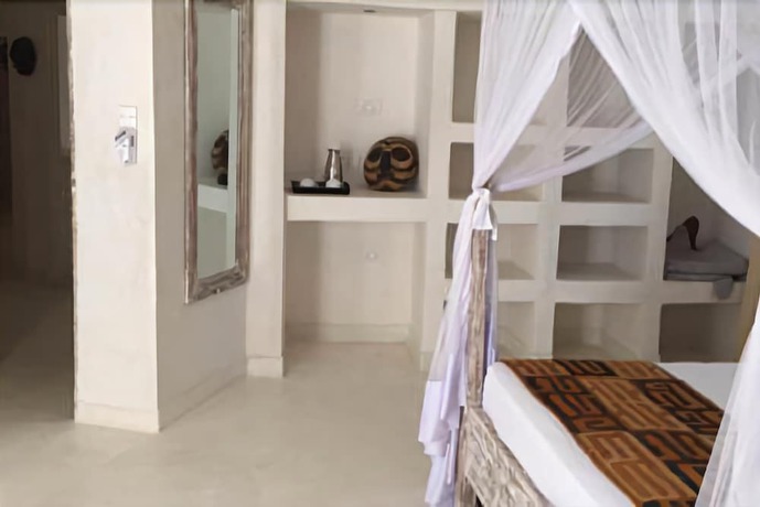 Imagen de la habitación del Hotel The Villa Luxury Suites Hotel. Foto 9