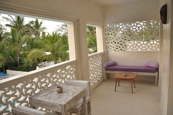 Imagen de la habitación del Hotel The Villa Luxury Suites Hotel. Foto 14