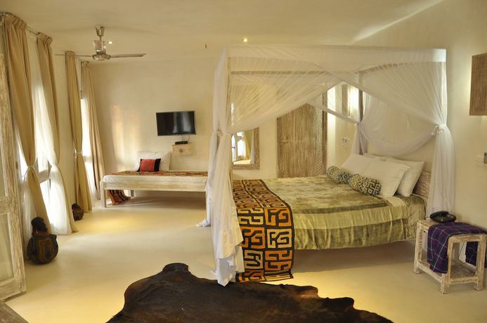 Imagen de la habitación del Hotel The Villa Luxury Suites Hotel. Foto 15