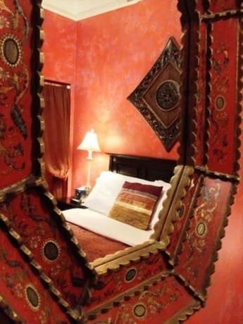 Imagen de la habitación del Hotel The Villa Toscana. Foto 3