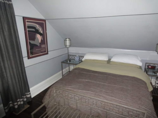 Imagen de la habitación del Hotel The Villa Toscana. Foto 13