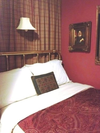 Imagen de la habitación del Hotel The Villa Toscana. Foto 15