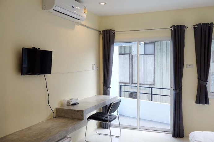 Imagen de la habitación del Hotel The Village, Bangkok. Foto 8