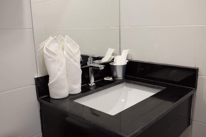Imagen de la habitación del Hotel The Village, Bangkok. Foto 10