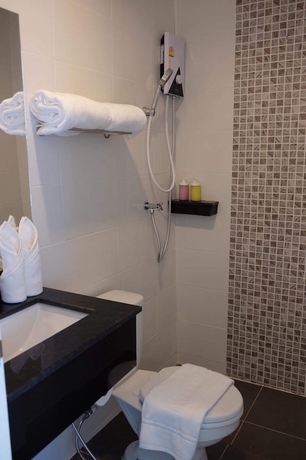 Imagen de la habitación del Hotel The Village, Bangkok. Foto 11