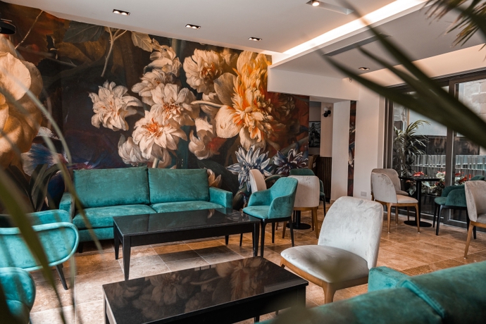 Imagen del bar/restaurante del Hotel The Village Boutique and Spa. Foto 3