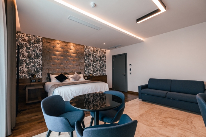 Imagen de la habitación del Hotel The Village Boutique and Spa. Foto 4