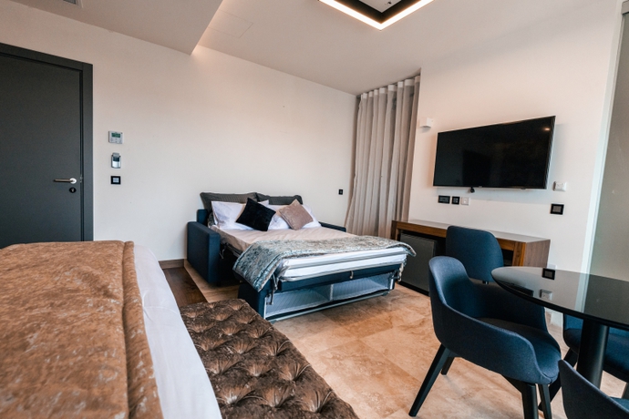 Imagen de la habitación del Hotel The Village Boutique and Spa. Foto 5